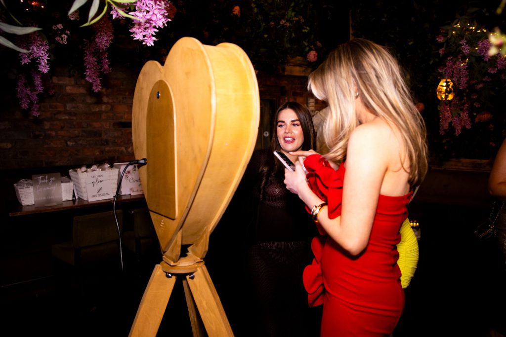 Photo of our Heart Selfie Photobooth in action taken by Emma Burnie Photography