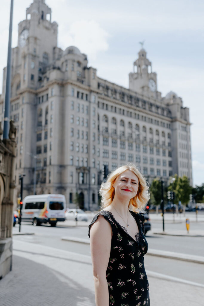Photo of the owner Rachael in front of the Liver Building, Liverpool